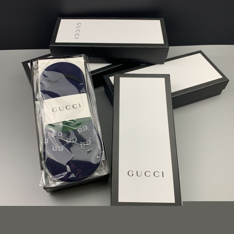 G*u*i socks
